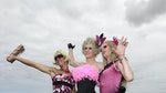 Drag Queens celebrate after a foot race during The Pink Stiletto race day in Sydney