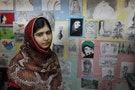 Pakistani teenage activist Malala Yousafza visits an art gallery for children at a UNICEF center at the Zaatri refugee camp