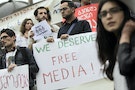 People attend a rally to mark World Press Freedom Day in Tbilisi