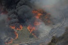 The Talega Fire burns at Camp Pendleton, California