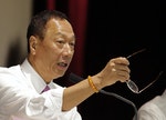 Terry Gou 郭台銘 Hon Hai Precision Industry Co. Ltd. Chairman Gou gestures while answering a question during the company's annual shareholder meeting in New Taipei City