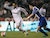 Deportivo Coruna's Sergio Garcia runs for the ball with Real Madrid's Wesley Sneider during their Spanish first division soccer match in Coruna
