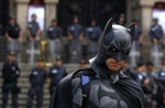 An anti-government demonstrator dressed as Batman poses at a protest during the Brazil's Independence Day in Rio de Janeiro