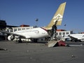 A damaged aircraft is pictured after shelling at Tripoli International Airport