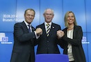 Newly elected European Council President Tusk and newly elected European High Representative for Foreign Affairs Mogherini are congratulated by outgoing European Council President Van Rompuy in Brusse