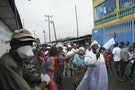 Residents of West Point celebrate the lifting of a quarantine by the Liberian government, in Monrovia