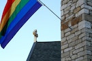 Rainbow flag on a church.