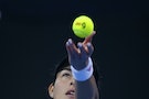 Ivanovic of Serbia serves to Sharapova of Russia during their women's singles semi-final match at the China Open tennis tournament in Beijing
