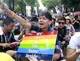 A protester shouts slogans during a rally to urge Taiwan's parliament to consider a bill that could legalize same-sex marriage outside the Legislative Yuan in Taipei