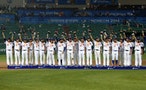 Taiwan team players wearing silver medals wave during an award ceremony following their baseball finle game at Munhak Baseball Stadium during the 2014 Asian Games in Incheon