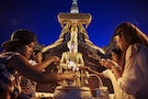 Believers pour water over a Buddha sculpture under the golden dome of Uppatasanti Pagoda in Naypyitaw
