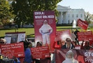 Registered nurses, as part of nationwide actions by Nurses United, hold a vigil calling on tougher Ebola safety precautions in the nation's hospitals while in front of the White House in Washington