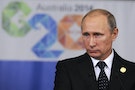 Russia's President Vladimir Putin attends a news conference at the end of the G20 summit in Brisbane