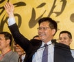 Progressive Party (DPP) Taichung mayoral candidate Lin Chia-lung celebrates after winning the local elections in Taichung