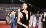 Taiwanese model and actress Sui poses for photographers on the red carpet at the 50th Golden Horse Film Awards in Taipei