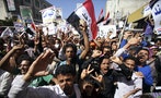 Anti-Houthi protesters shout slogans to commemorate the fourth anniversary of the uprising that toppled former president Saleh, in Taiz
