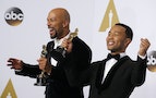 Common and John Legend take the stage to pose with their Oscars after winning the award for best original song for "Glory" from the film "Selma," during the 87th Academy Awards in Hollywood