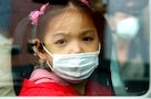 GIRL WITH SURGICAL MASK
