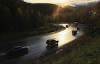 Vehicles drives along the M54 Yenisei Federal Highway during sunset outside Russia's Siberian city of Krasnoyarsk