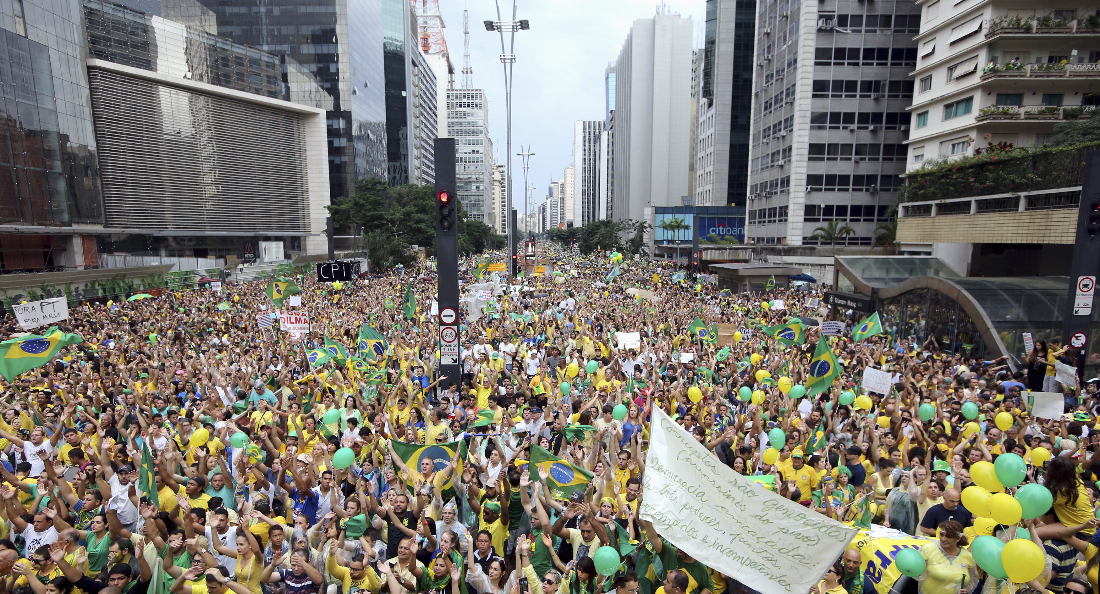Demonstrators attend a protest against Brazil's President Dilma Rousseff at Paulista avenue in Sao Paulo