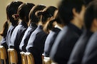 Pupils listen to Midori Komori, whose daughter Kasumi Komori committed suicide because of bullying on July 27, 1998 at the age of 15, at a junior high school in Sakura, east of Tokyo