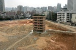 A six-floor villa is viewed on the construction site in the central business district of Shenzhen