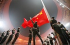 File photo of China's national flag being raised during the opening ceremony of the Beijing 2008 Olympic Games at the National Stadium