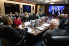 U.S. President Barack Obama receives an update in the Situation Room at the White House in Washington from Secretary of State John Kerry during the Iran nuclear talks in this White House handout photo