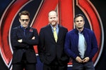 Director Joss Whedon poses with cast members Robert Downey Jr. and Mark Ruffalo at a news conference for "Avengers: Age of Ultron" in Beijing