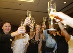 Democrats including Vanessa Batt (C) of New Jersey celebrate at the American Club in Singapore