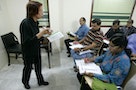 華語文教學 中文 Chinese woman teaches Chinese language to Indians at school in Kolkata