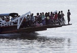 Cambodian villagers who live along the Mekong River use ferry for transportation near Phnom Penh, Cambodia, Tuesday, April 19, 2011. Laos has deferred decision on erecting in the first dam on the lower Mekong River in face of strong opposition from neighboring countries including its closest ally, Vietnam. (AP Photo/Heng Sinith)