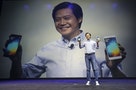 Lei Jun, founder and Chief Executive Officer of China's mobile company Xiaomi, shows Mi Notes at its launch in Beijing