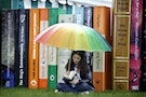 Teenage Girl Reading at Hay-on-Wye Book Festival