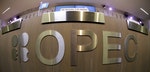 A table with OPEC logo is seen during the presentation of OPEC's 2013 World Oil Outlook in Vienna