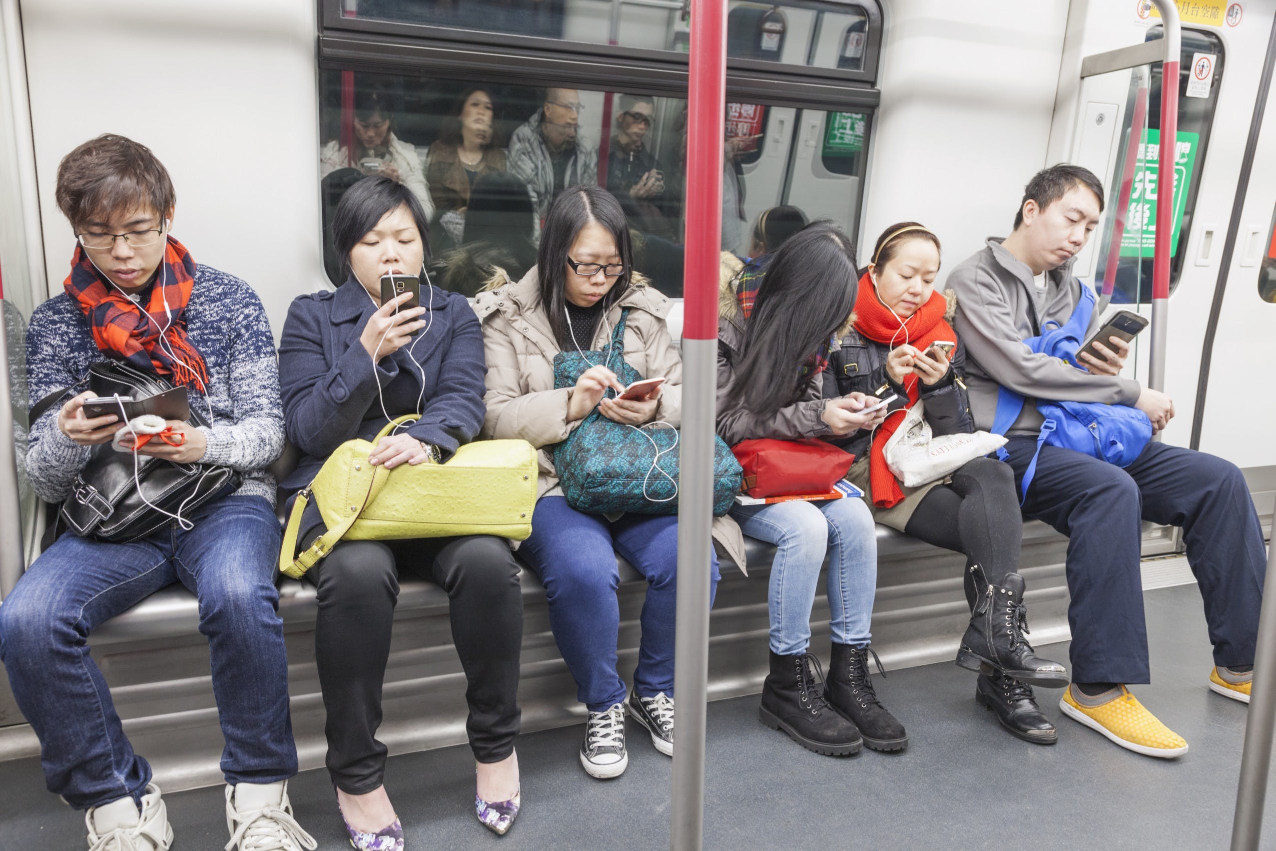 Subway Passengers Using Electronic Devices ,Hong Kong