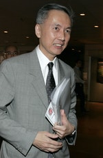 Ng, chairman of Sino Land Co. Ltd, attends a land auction in Hong Kong