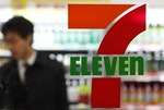 A customer is seen at a 7-Eleven convenience store in Tokyo