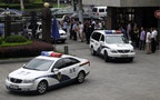 A police vehicle believed to be carrying British investigator Peter Humphrey (not pictured), arrives at the Shanghai No.1 Intermediate People's Court in Shanghai