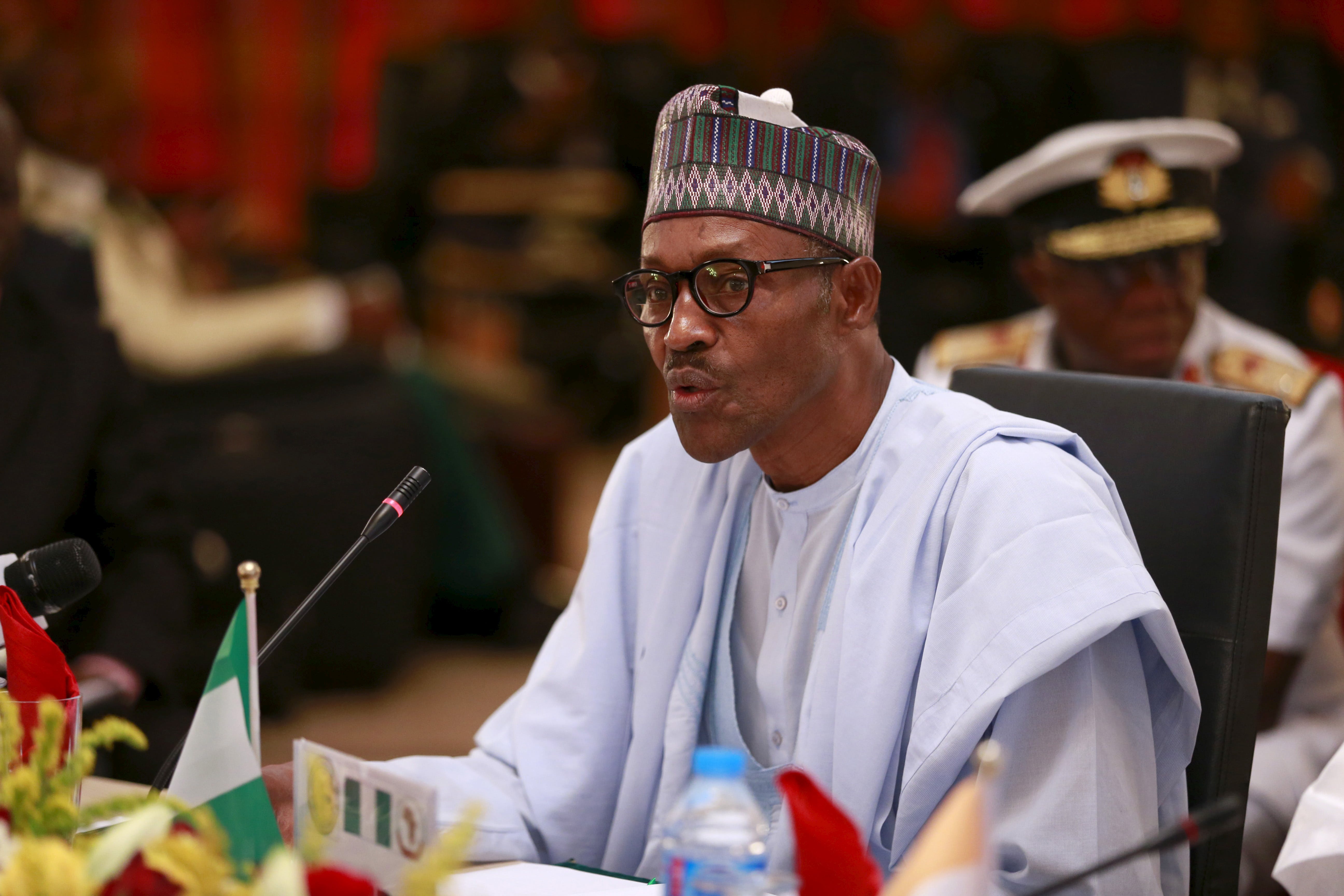 Nigeria's President Muhammadu Buhari speaks during opening ceremony for Summit of Heads of State and Governments of the Lake Chad Basin Commission at presidential wing of Nnamdi Azikiwe International 
