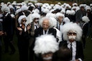 Benny Wasserman, stands with others dressed as Albert Einstein as they gather to establish Guinness world record for largest Einstein gathering, to raise money for School on Wheels and homeless childr