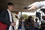 Blogger Roy Ngerng speaks to the media after attending a damages hearing in a defamation case by Singapore's Prime Minister Lee Hsien Loong at the Supreme Court in Singapore