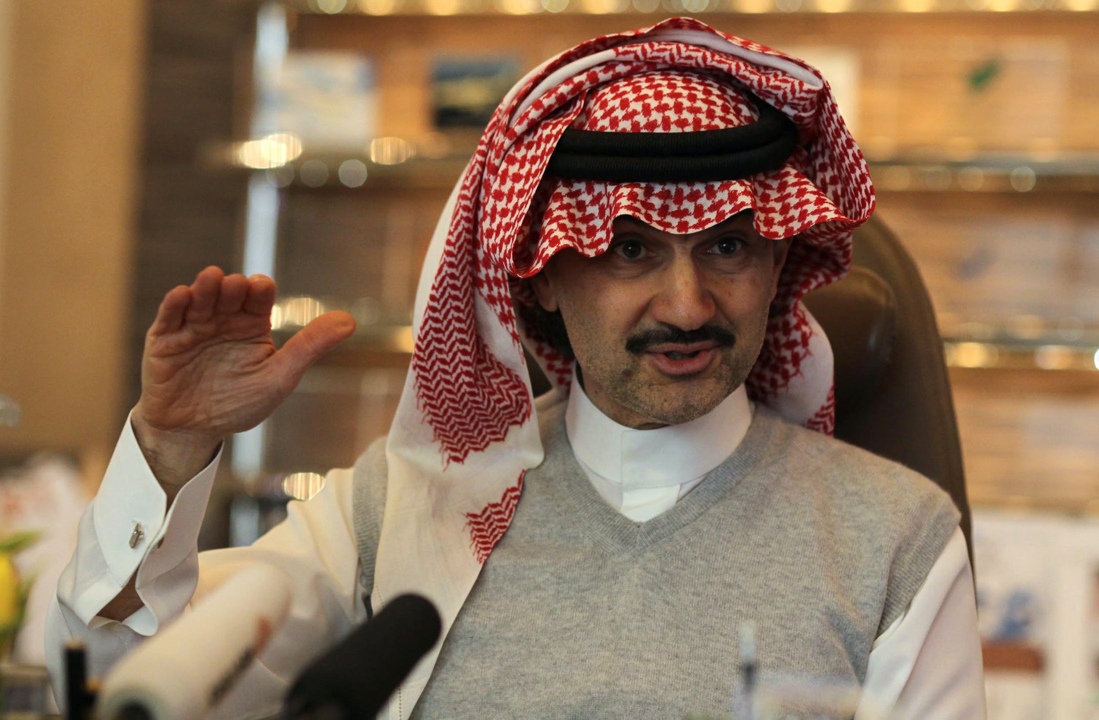 Saudi Prince Alwaleed bin Talal speaks during an interview with Reuters at his offices in Kingdom Tower in Riyadh