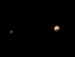 左 ─ 冥衛一（Charon）   右 ─ 冥王星（Pluto） 攝於2015年7月8日，再根據由Ralph instrument獲得的色彩資料著色 -   NASA 