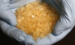 A member of the German Criminal Investigation Division (BKA) displays Crystal Methamphetamine (Crystal Meth) during a news conference at the BKA office in Wiesbaden