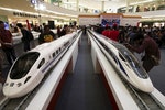 Models of high speed trains are seen during the China High Speed Railway on Fast Track exhibition in Jakarta
