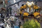 Experts investigate the Erawan shrine at the site of a deadly blast in central Bangkok