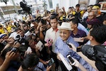 Former Malaysian Prime Minister Mahathir Mohamad speaks to the media during a rally organised by pro-democracy group 
