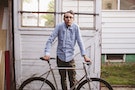Young man with a fixed gear bike in Portland.