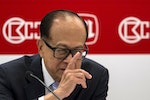 Hutchison Whampoa Chairman Li Ka-shing reacts during a news conference announcing the company's annual results in Hong Kong